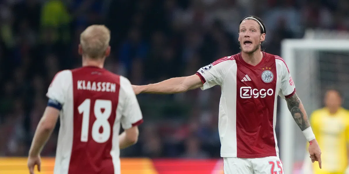 Klaassen grapt met ex-wereldkampioen darten: 'Wilde een koptelefon opzetten'